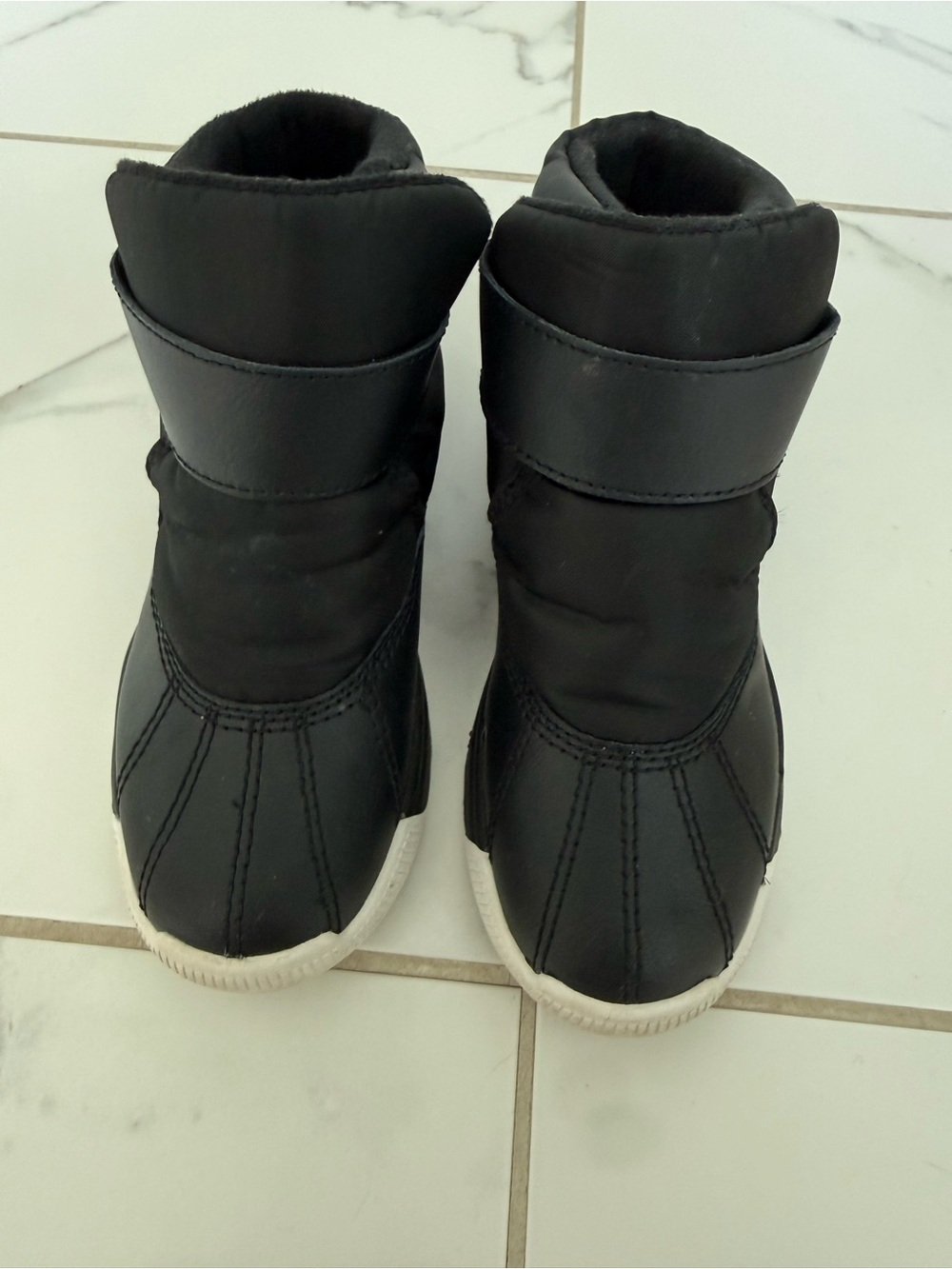Sorel Kids Black Slip-On Winter Boots with White Sole